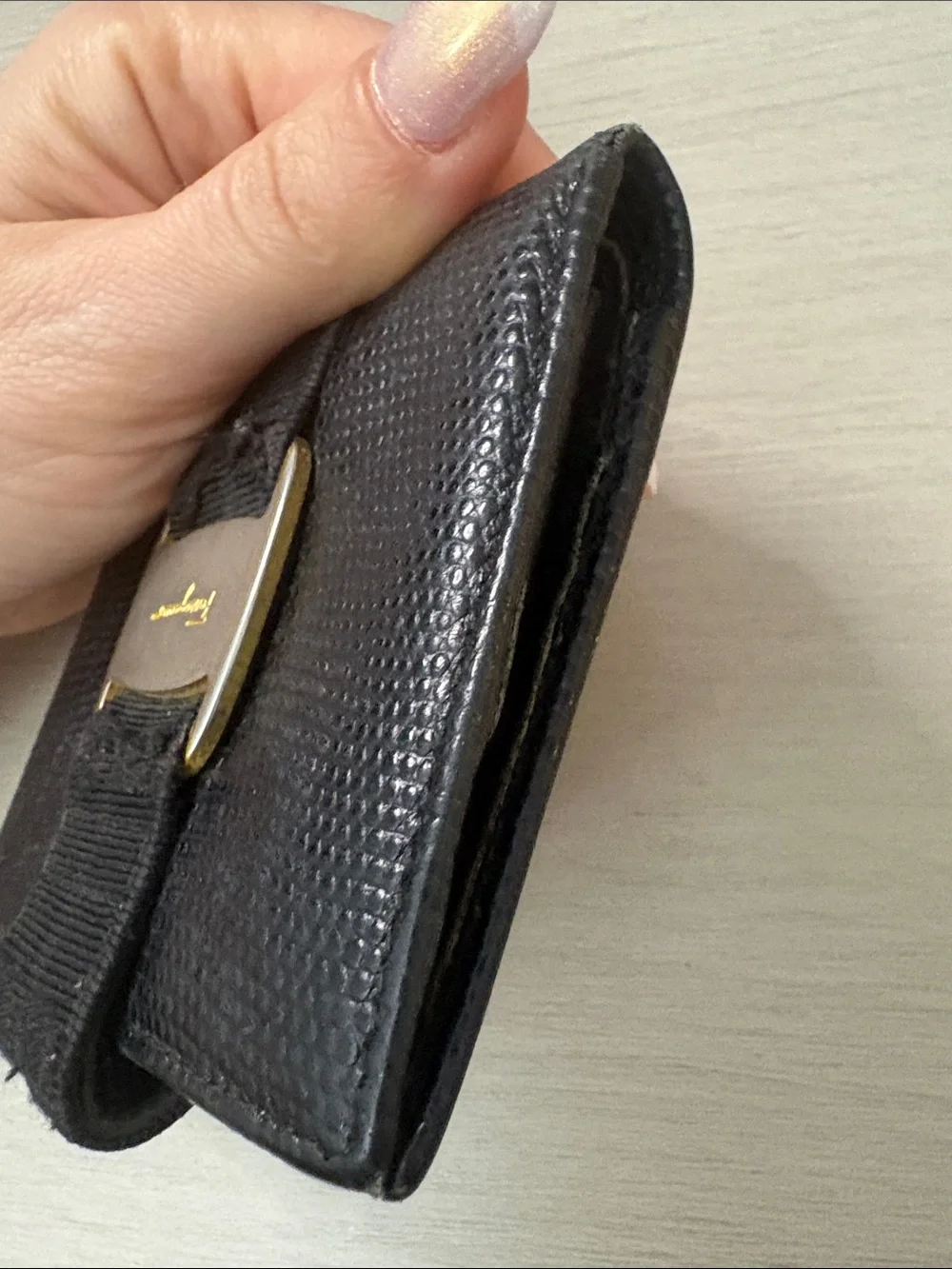 Salvatore Ferragamo Black Textured Leather Wallet with Gold Buckle